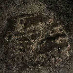 Short curly Bob lace frontal wig with middle part human hair.